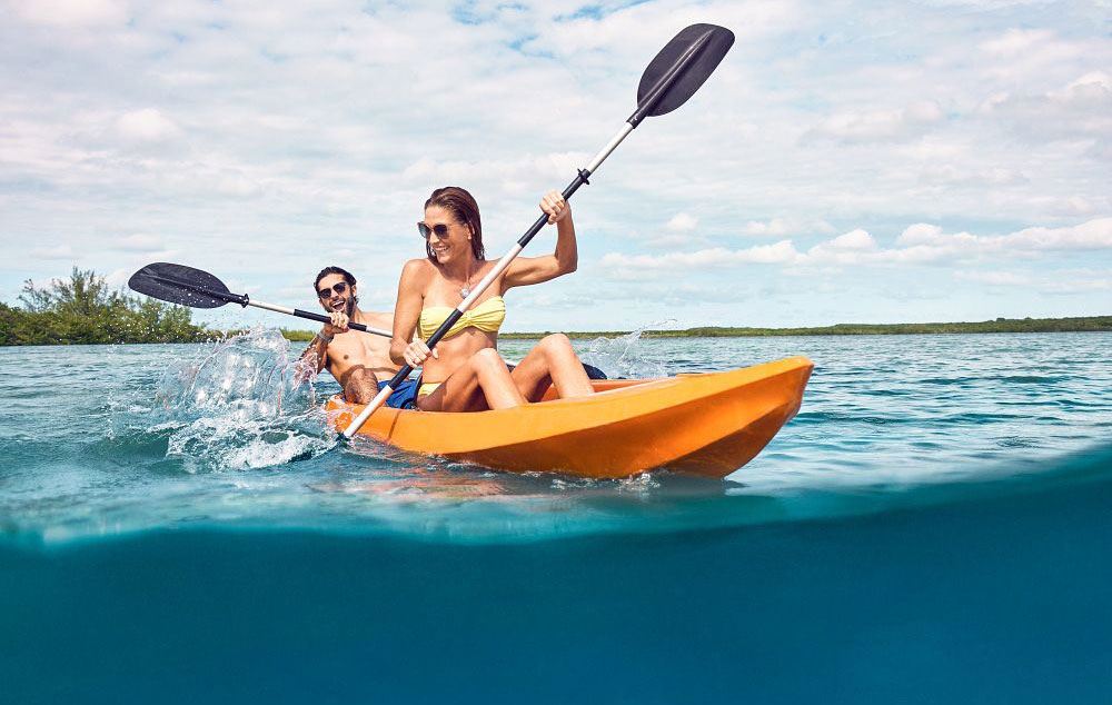 couple kayaking on princess excursion