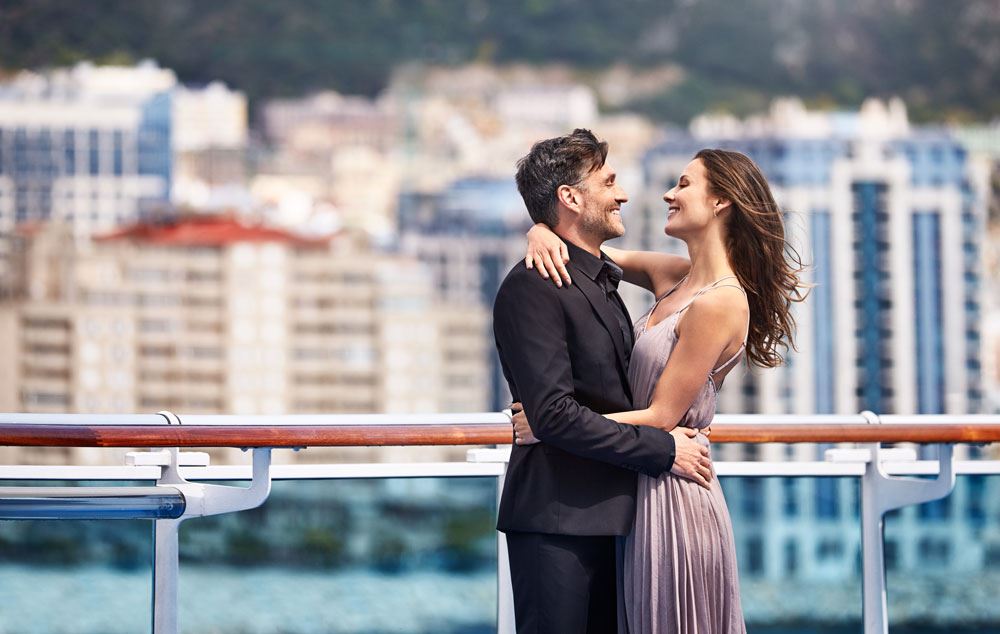 couple admiring eachother in embrace on princess cruise ship